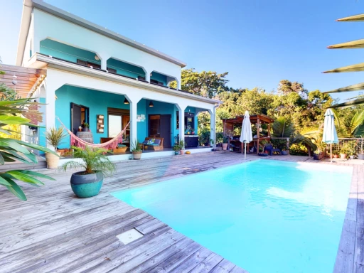 VILLA COUP DE COEUR AVEC PISCINE ET VUE MER - LA POSSESSION (Quartier Ravine à malheur)